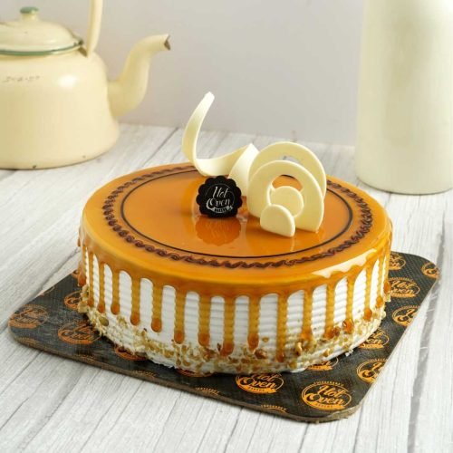 Butterscotch-Cake-Thekkekara-s-Hot-Oven-Bakers-1667922340